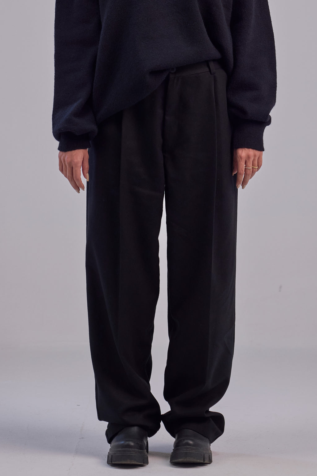 Black wool wide leg pleated trousers