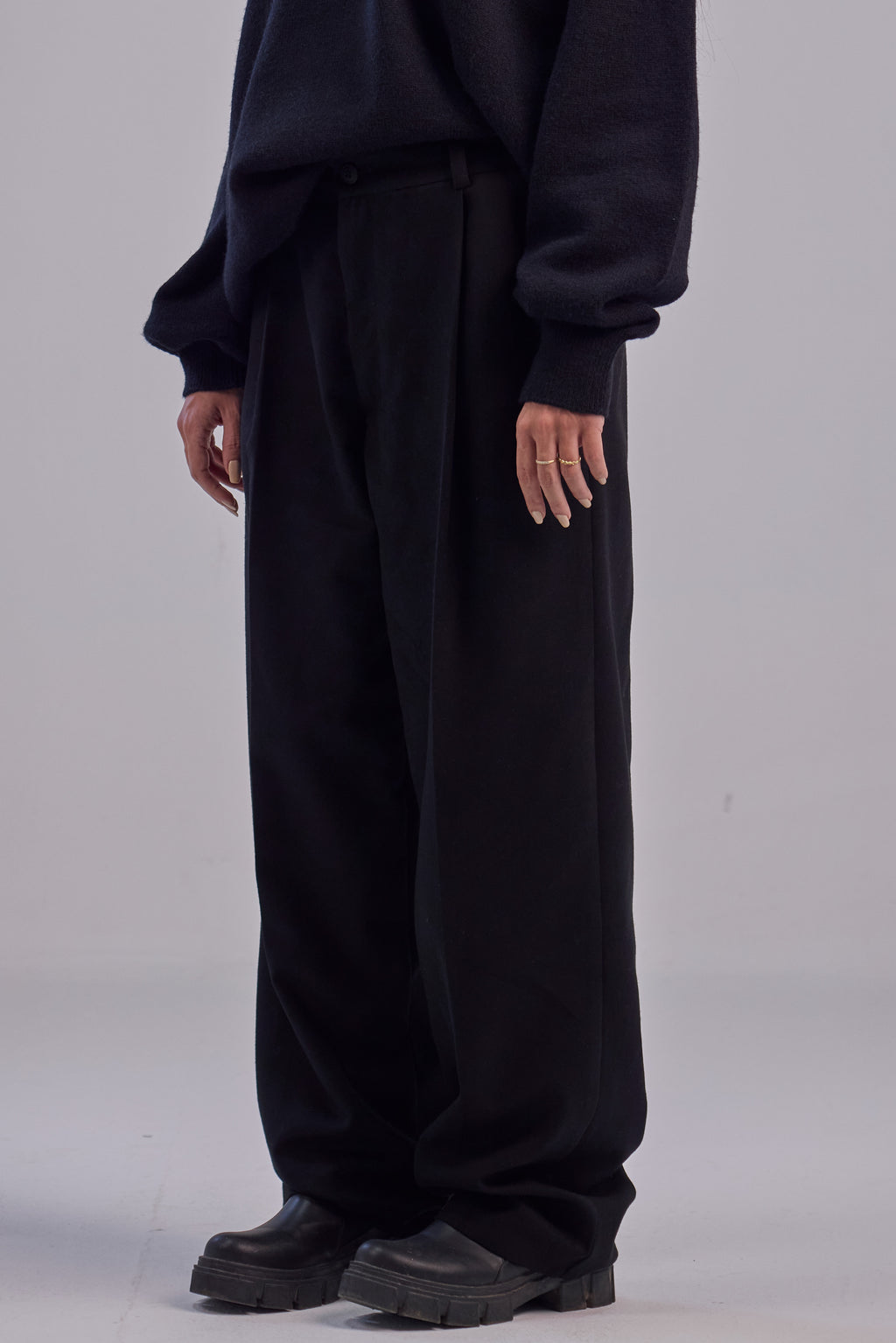 Black wool wide leg pleated trousers