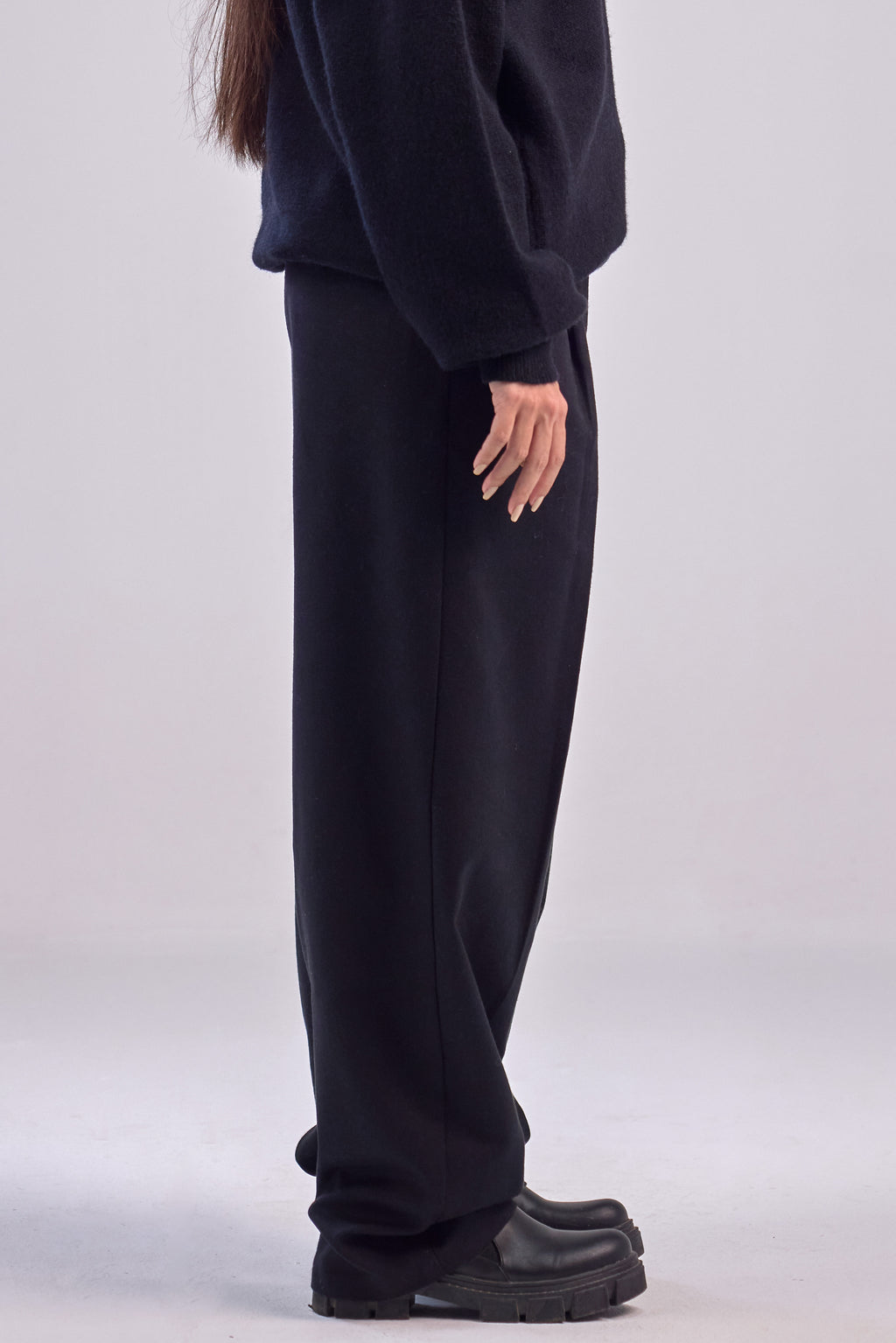 Black wool wide leg pleated trousers