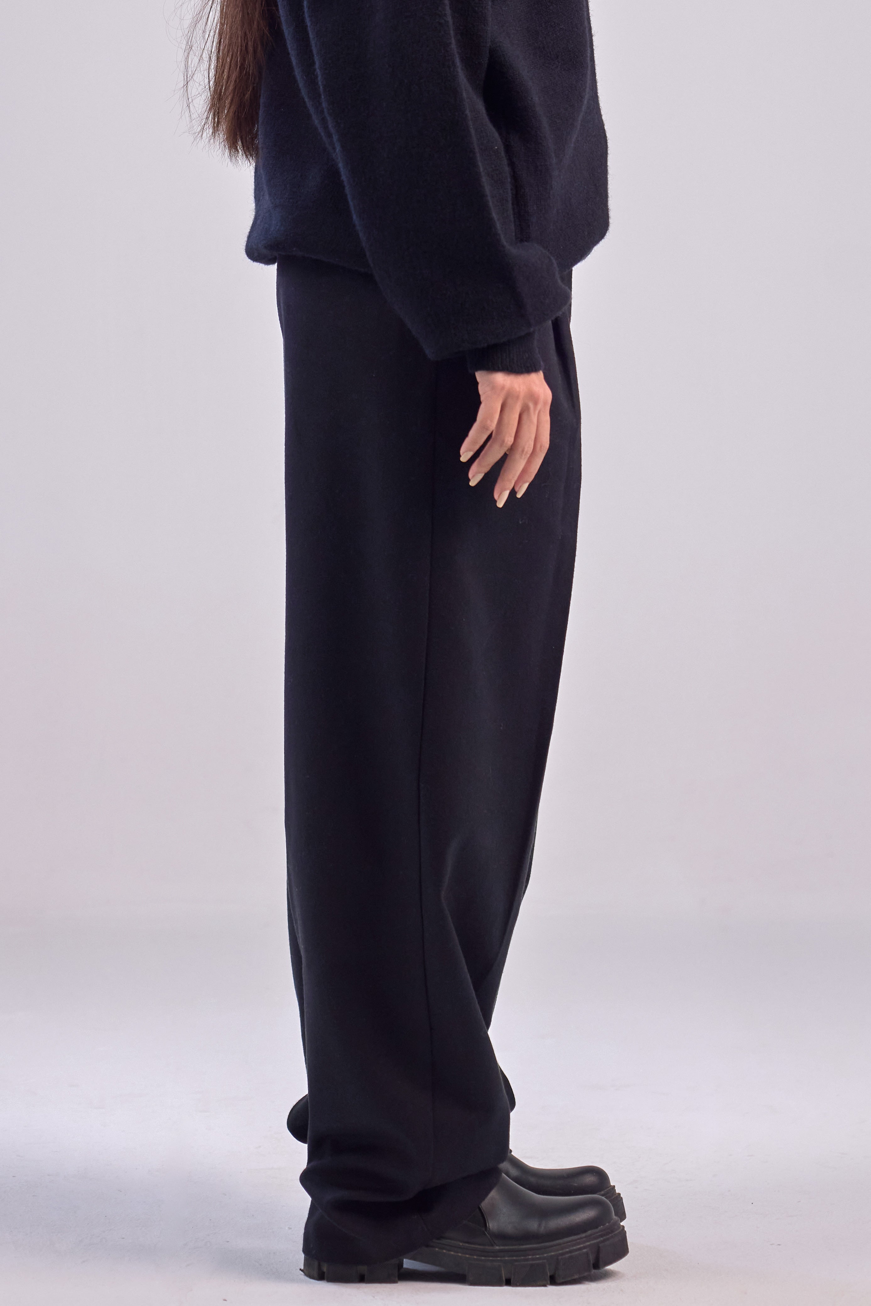 Black wool wide leg pleated trousers