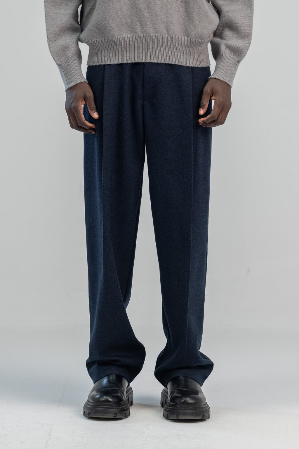 Navy wool wide leg pleated trousers