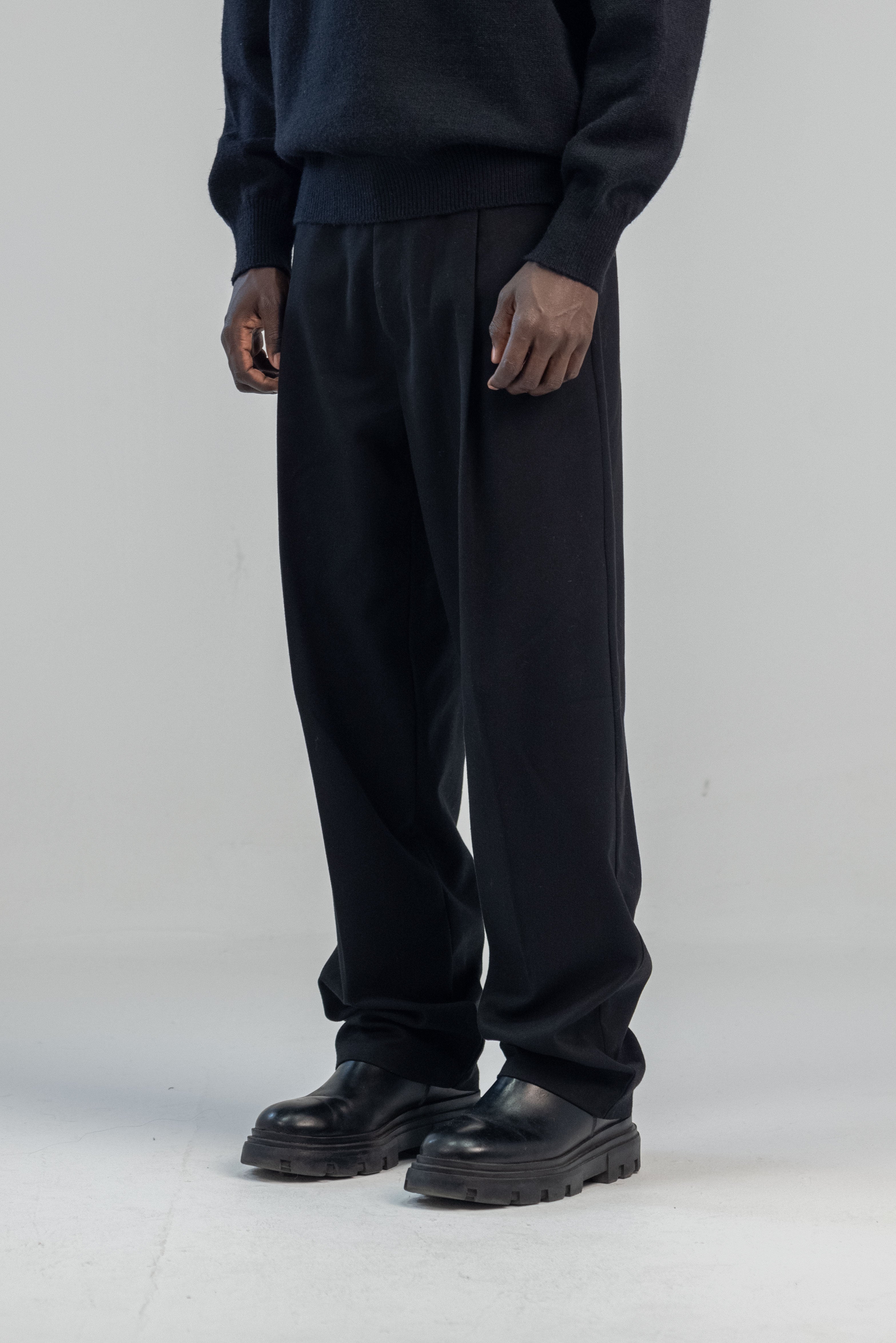 Black wool wide leg pleated trousers