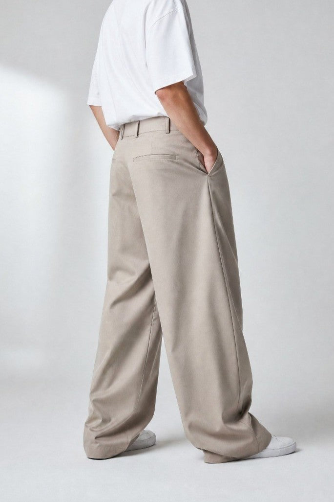 Beige pleated wide leg pants